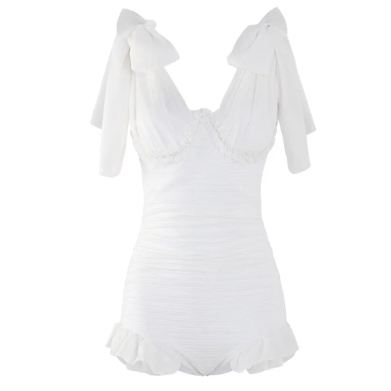 Channeling the Little Chanel Vibe with Our Fairy-Inspired One-Piece Swimsuit